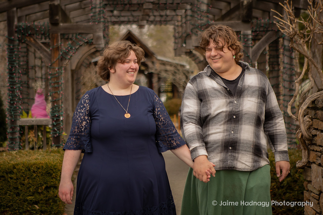 Couple Walking and Holding hands at NC Arboretum