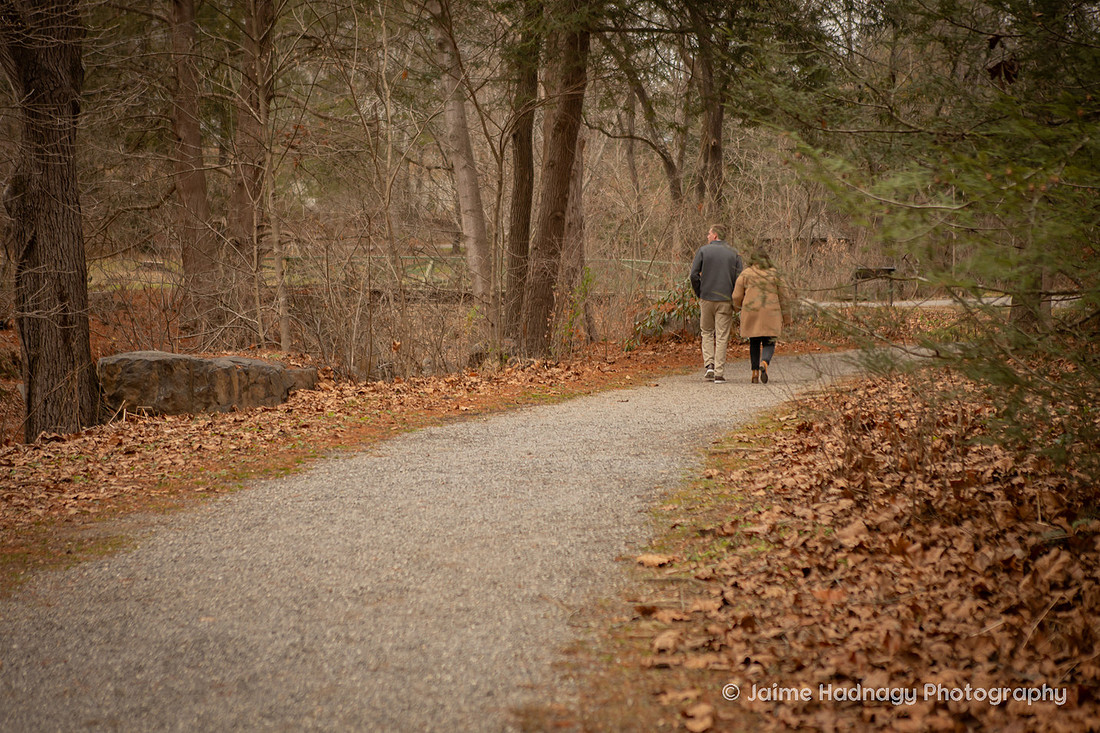Couple wallking in the Botanical Gardens Asheville during Winter