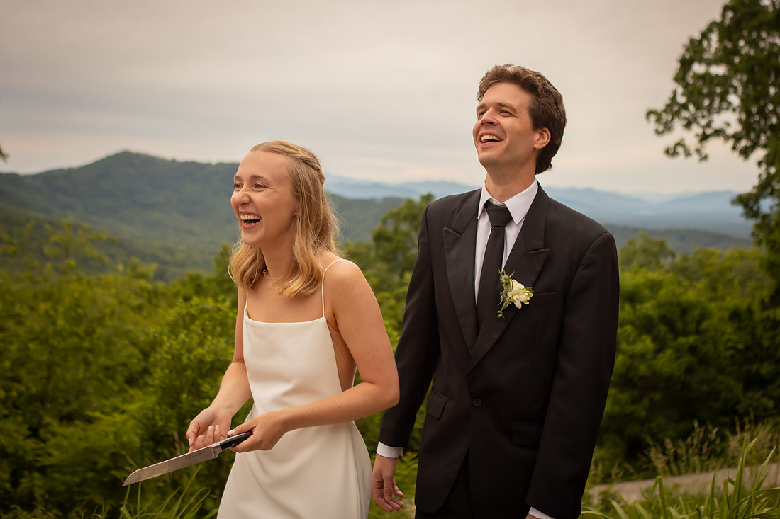 Bride and Groom Laughing in the Mountains