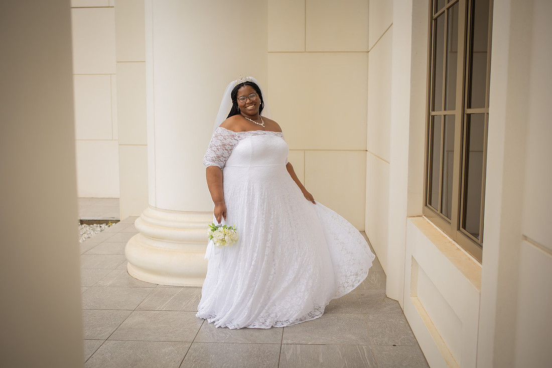 Bride outside of the Spartanburg Courthouse | Wedding Photographer