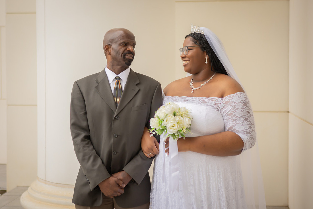 Bride outside of the Spartanburg Courthouse | Wedding Photographer