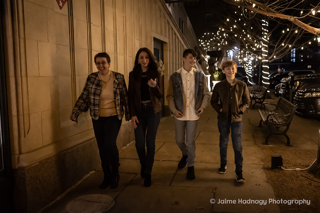WIntertime Evening Family Photoshoot in Downtown Asheville with Christmas Lights