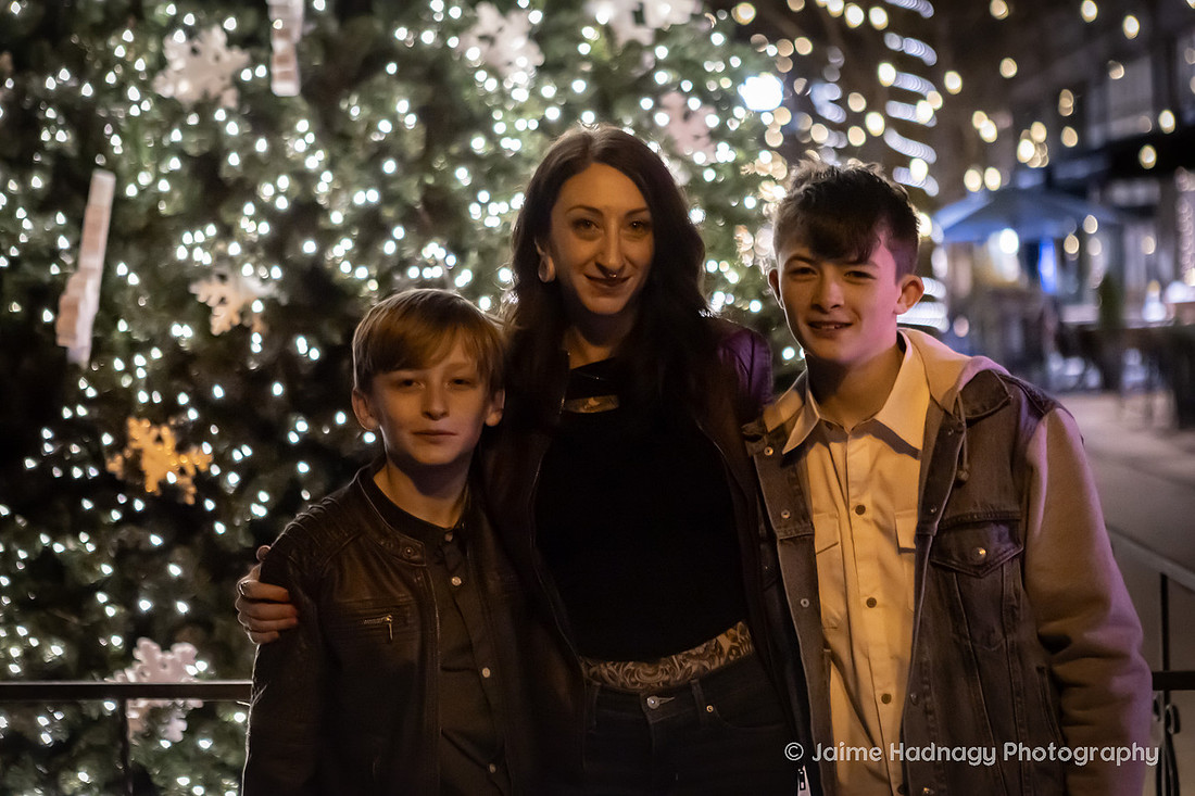 WIntertime Evening Family Photoshoot in Downtown Asheville with Christmas Lights