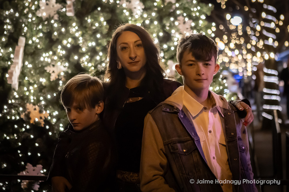 WIntertime Evening Family Photoshoot in Downtown Asheville with Christmas Lights
