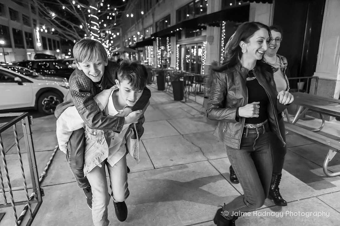 WIntertime Evening Family Photoshoot in Downtown Asheville with Christmas Lights