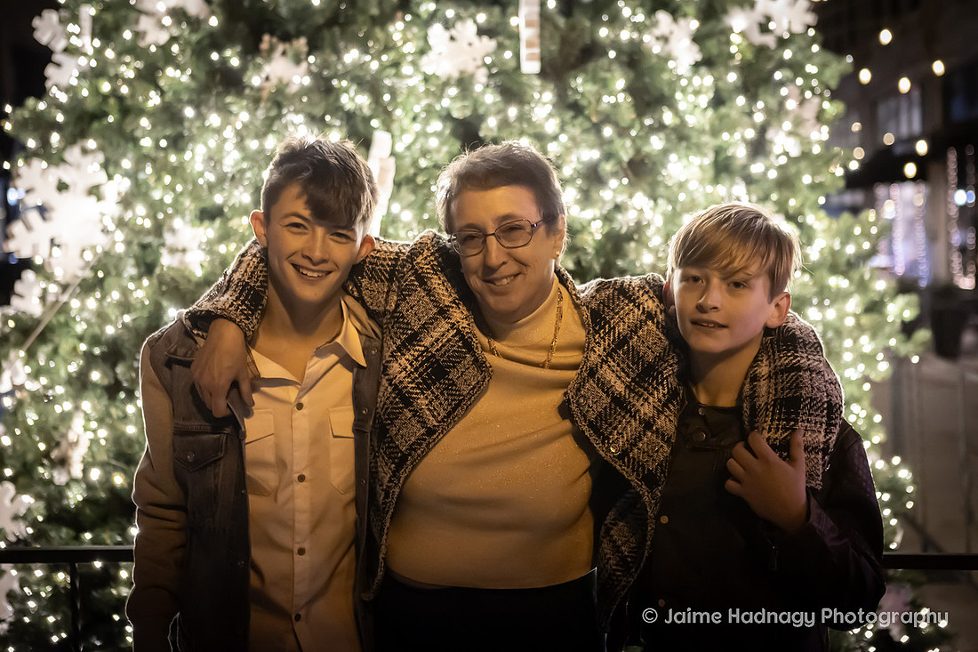 WIntertime Evening Family Photoshoot in Downtown Asheville with Christmas Lights