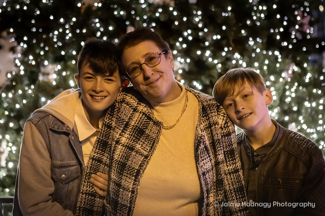 WIntertime Evening Family Photoshoot in Downtown Asheville with Christmas Lights