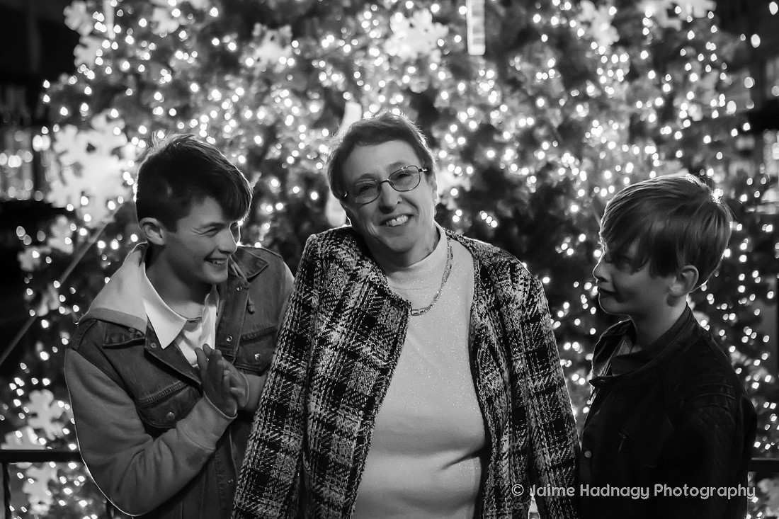 WIntertime Evening Family Photoshoot in Downtown Asheville with Christmas Lights
