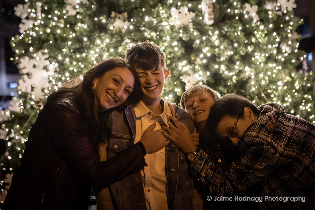 WIntertime Evening Family Photoshoot in Downtown Asheville with Christmas Lights