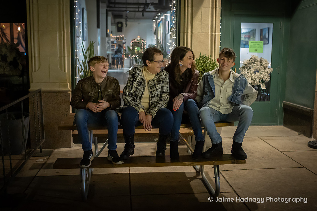 WIntertime Evening Family Photoshoot in Downtown Asheville with Christmas Lights