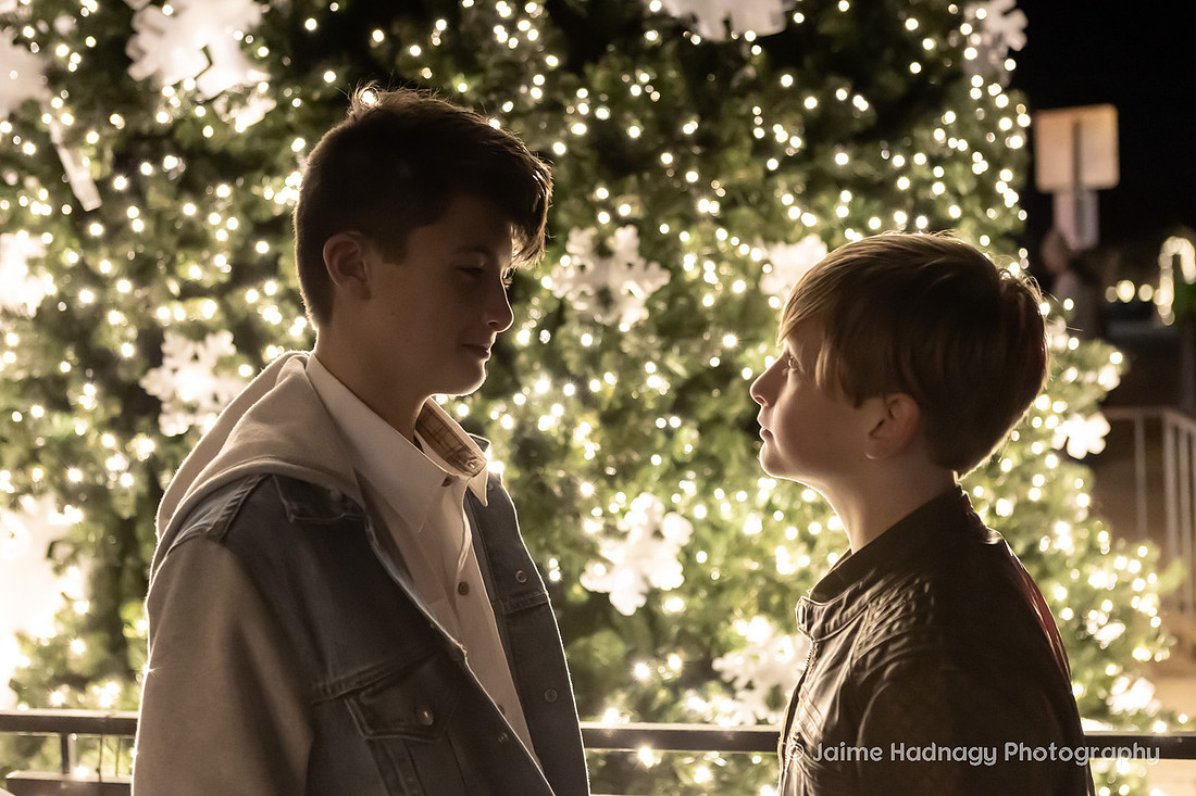 WIntertime Evening Family Photoshoot in Downtown Asheville with Christmas Lights