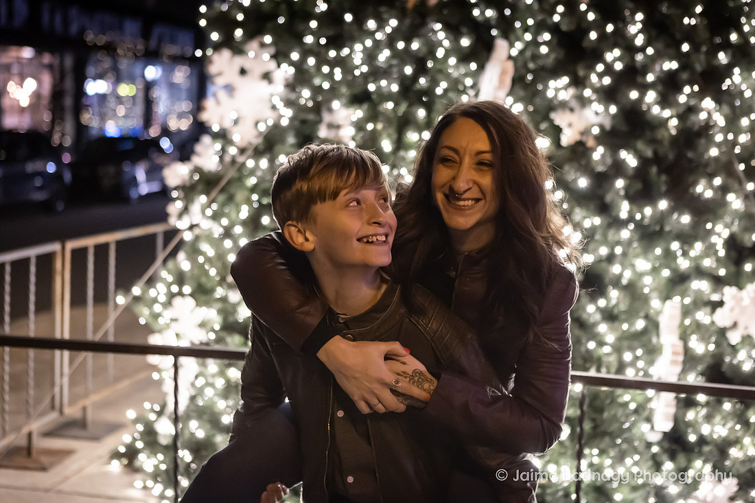 WIntertime Evening Family Photoshoot in Downtown Asheville with Christmas Lights