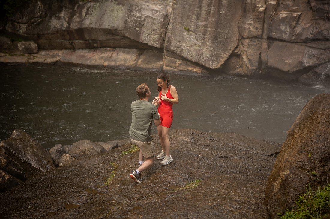 Hiking Proposal in front of Rainbow Falls in Gorges State Park | WNC Engagement Photographer