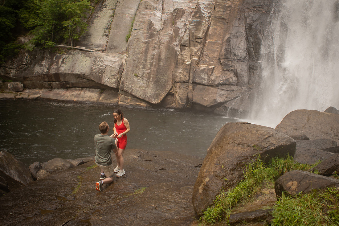 Hiking Proposal in front of Rainbow Falls in Gorges State Park | WNC Engagement Photographer