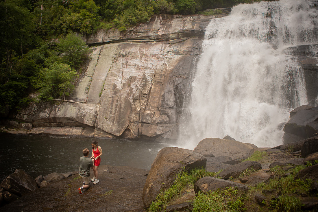 Hiking Proposal in front of Rainbow Falls in Gorges State Park | WNC Engagement Photographer
