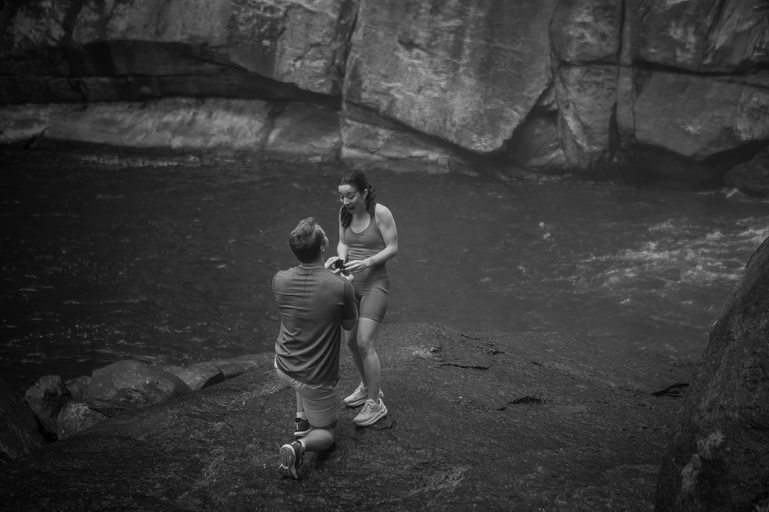 Hiking Proposal in front of Rainbow Falls in Gorges State Park | WNC Engagement Photographer
