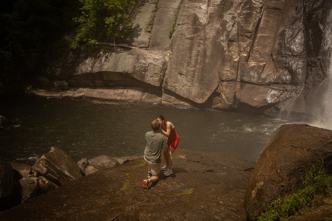 Hiking Proposal in front of Rainbow Falls in Gorges State Park | WNC Engagement Photographer