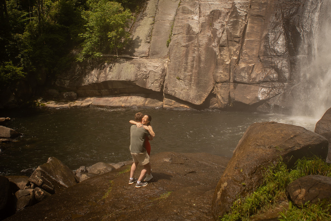 Hiking Proposal in front of Rainbow Falls in Gorges State Park | WNC Engagement Photographer