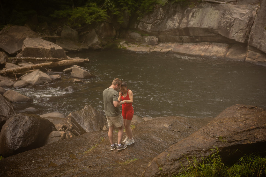 Hiking Proposal in front of Rainbow Falls in Gorges State Park | WNC Engagement Photographer
