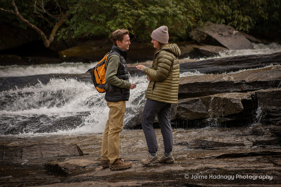 Surprise Proposal on a Waterfall HIke in Dupont State Forest at Triple Falls