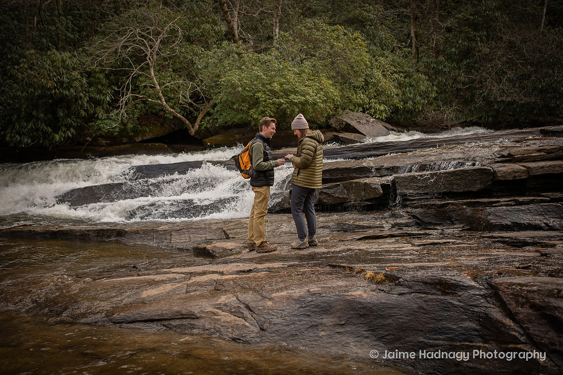 Surprise Proposal on a Waterfall HIke in Dupont State Forest at Triple Falls