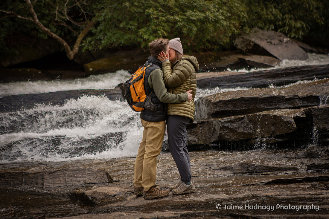 Surprise Proposal on a Waterfall HIke in Dupont State Forest at Triple Falls