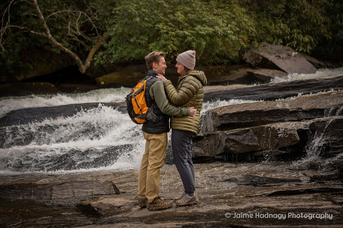 Surprise Proposal on a Waterfall HIke in Dupont State Forest at Triple Falls