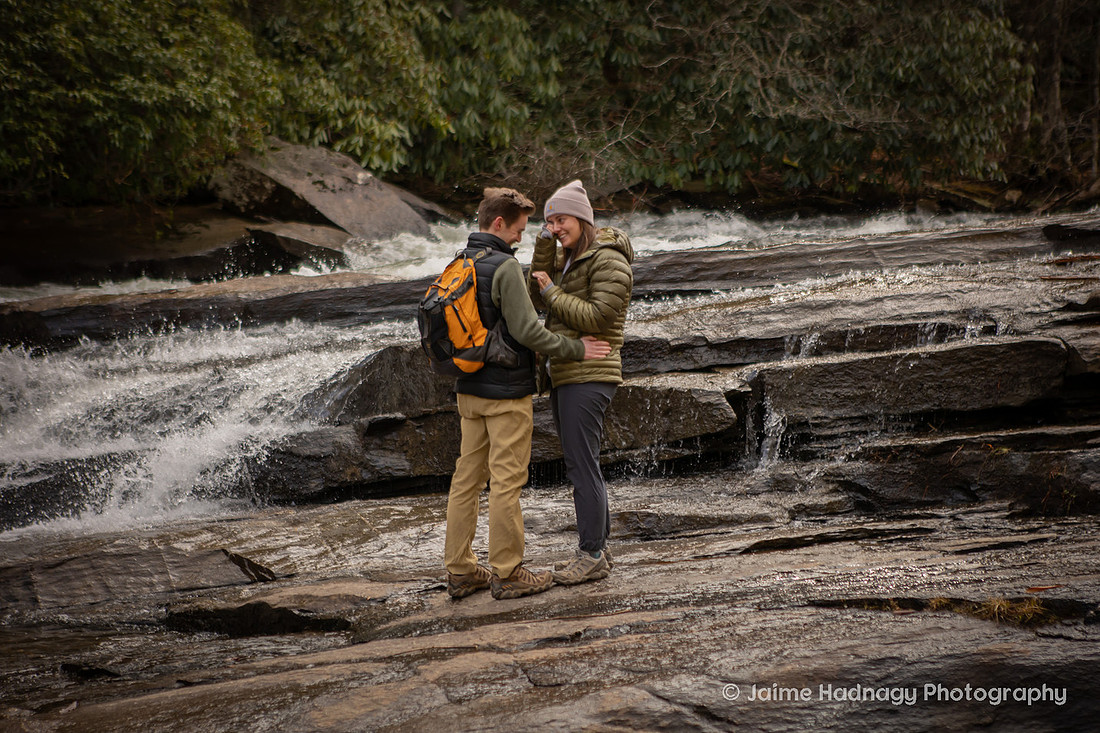 Surprise Proposal on a Waterfall HIke in Dupont State Forest at Triple Falls
