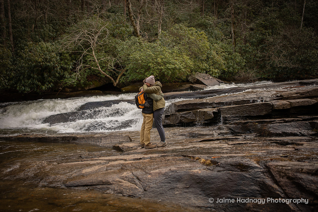 Surprise Proposal on a Waterfall HIke in Dupont State Forest at Triple Falls
