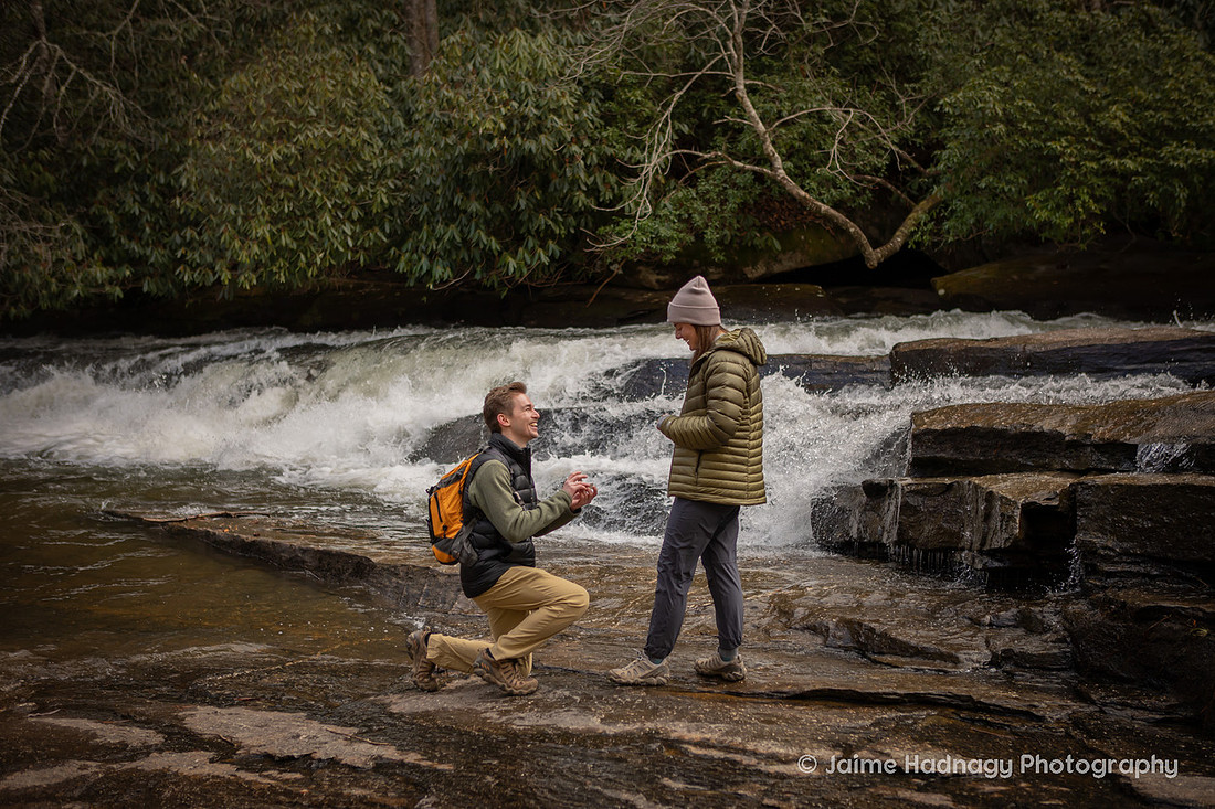 Surprise Proposal on a Waterfall HIke in Dupont State Forest at Triple Falls