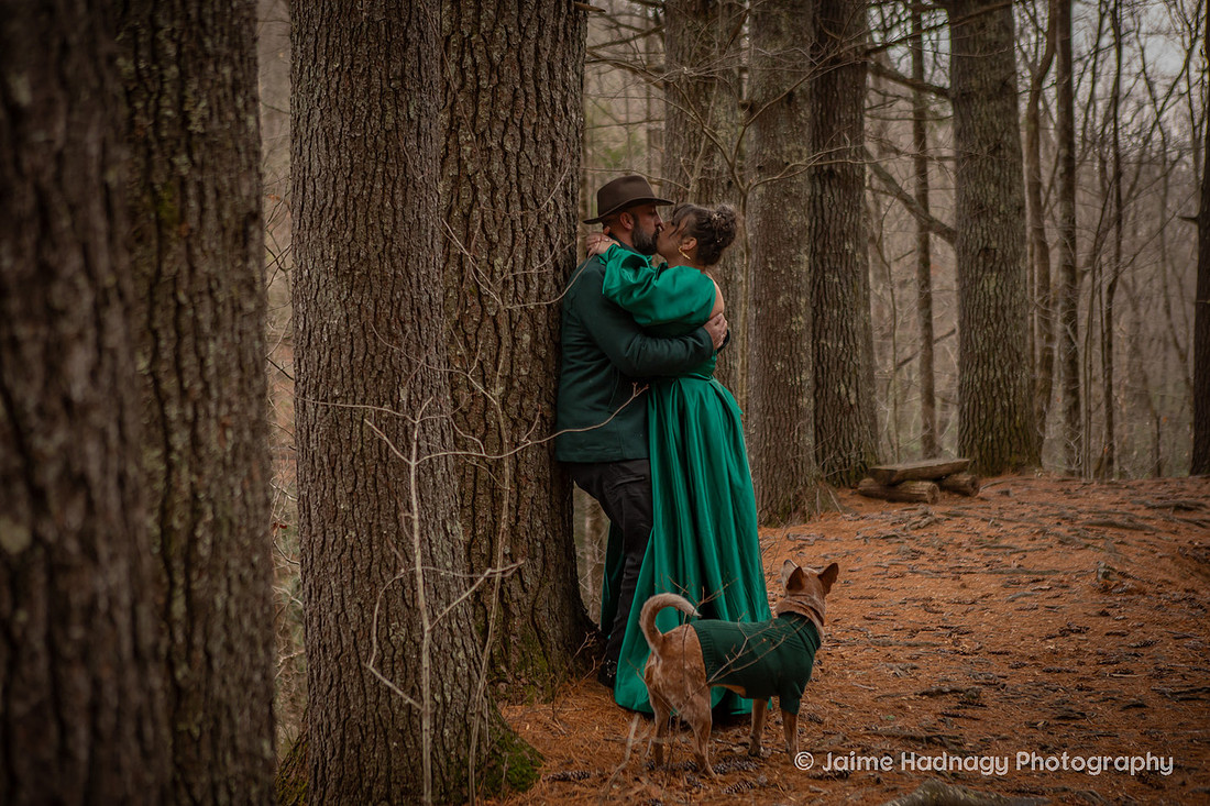 Couples Photos with Green Outfits in the Forest in Wintertime | Black Mountain Portrait Photogapher