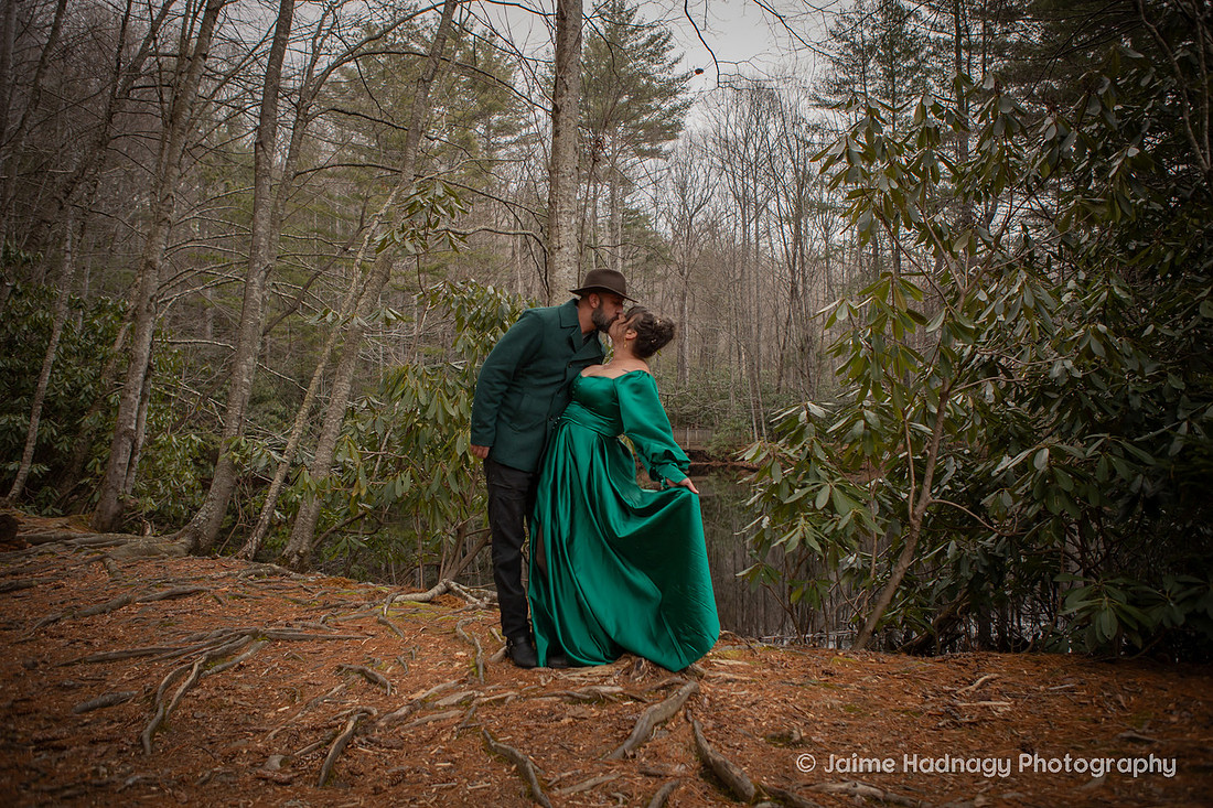 Couples Photos with Green Outfits in the Forest in Wintertime | Black Mountain Portrait Photogapher