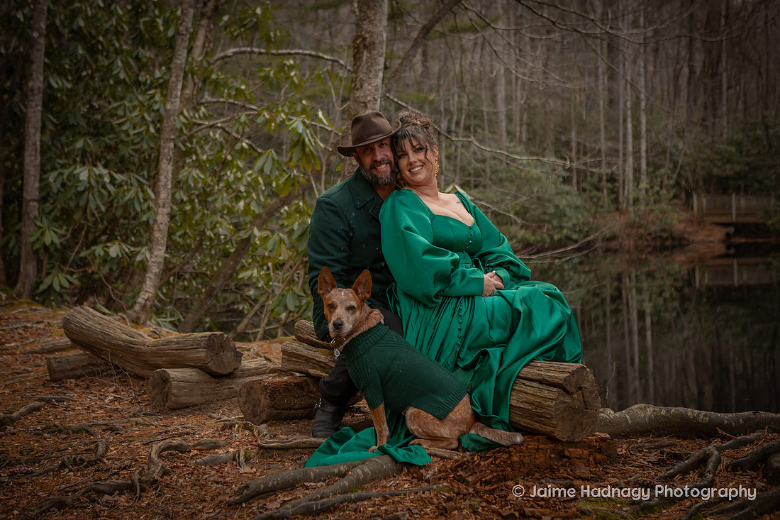 Couples Photos with Green Outfits in the Forest in Wintertime | Black Mountain Portrait Photogapher