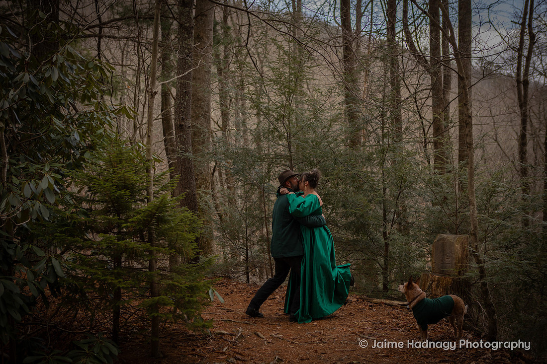 Couples Photos with Green Outfits in the Forest in Wintertime | Black Mountain Portrait Photogapher