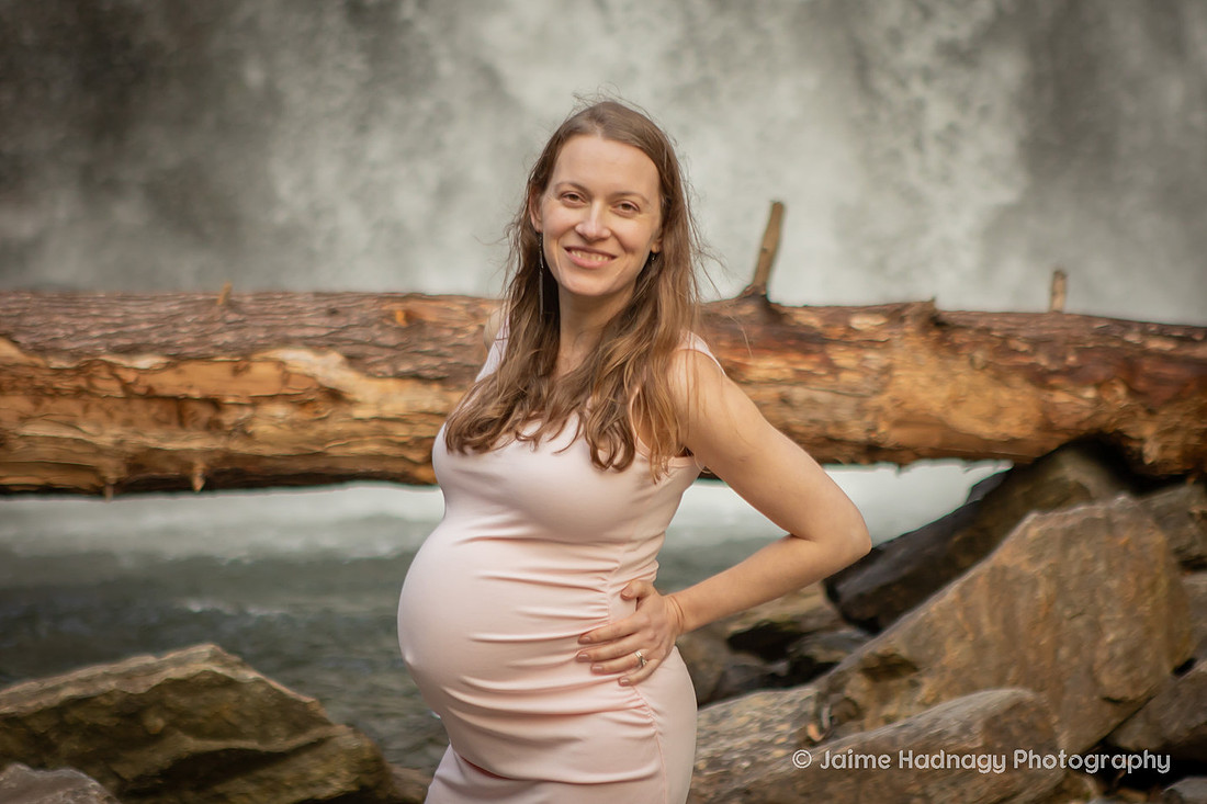 Nature Loving Couples Pregnancy Photos at Looking Glass Falls | Asheville Family Photographer