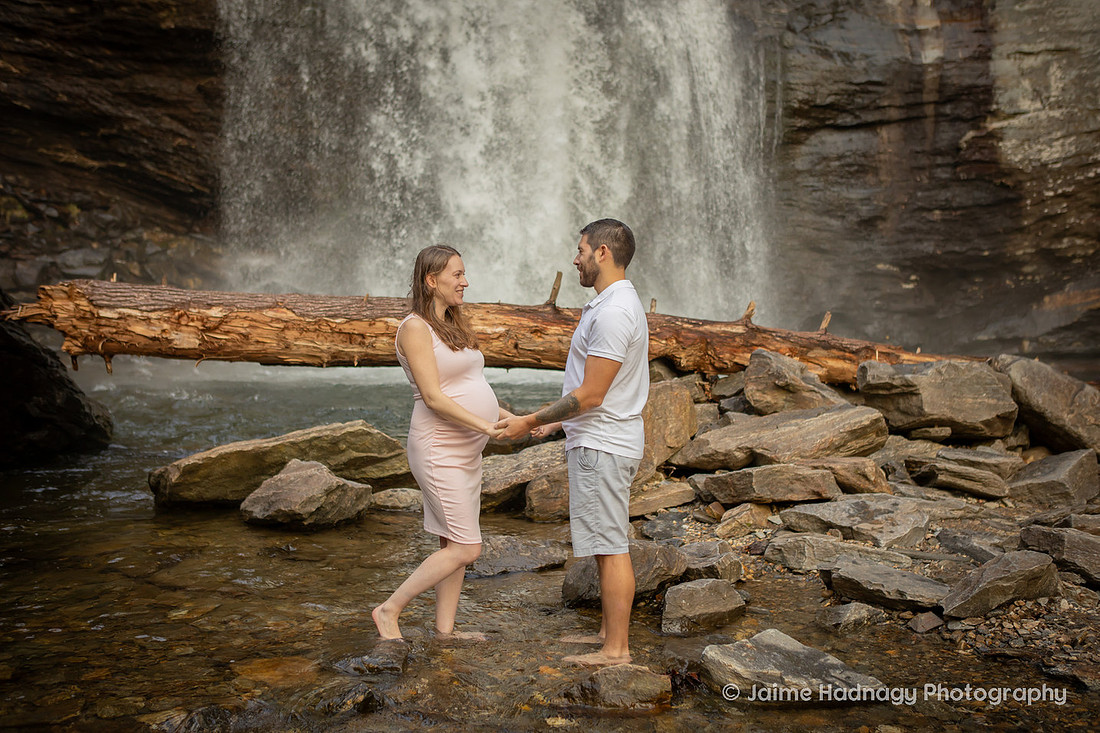 Nature Loving Couples Pregnancy Photos at Looking Glass Falls | Asheville Family Photographer