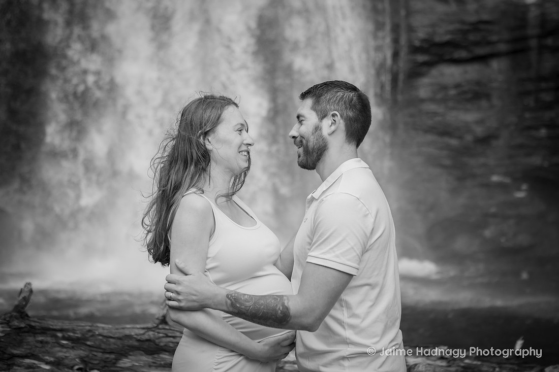 Nature Loving Couples Pregnancy Photos at Looking Glass Falls | Asheville Family Photographer