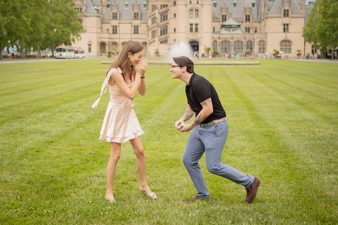 Proposal on the front lawn of the Biltmore Estate | Asheville Engagement Photographer