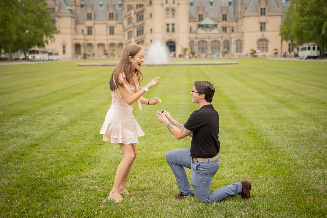 Proposal on the front lawn of the Biltmore Estate | Asheville Engagement Photographer