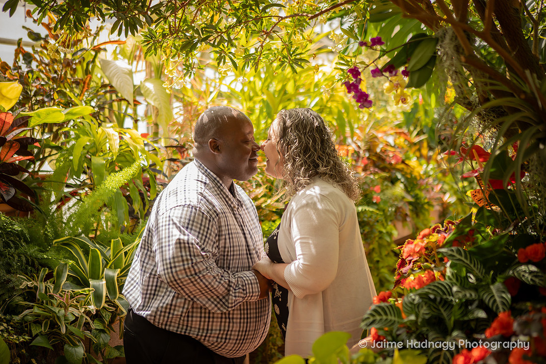 Couple in a greenhouse