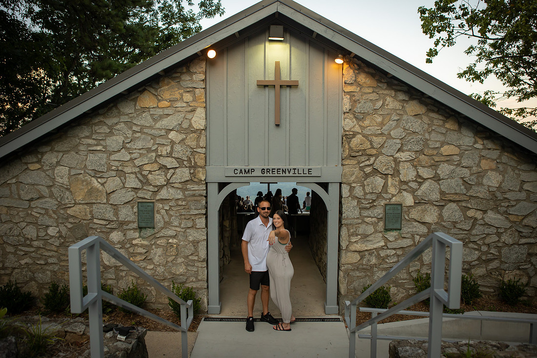 Couple in Front of Pretty Place Chapel Building