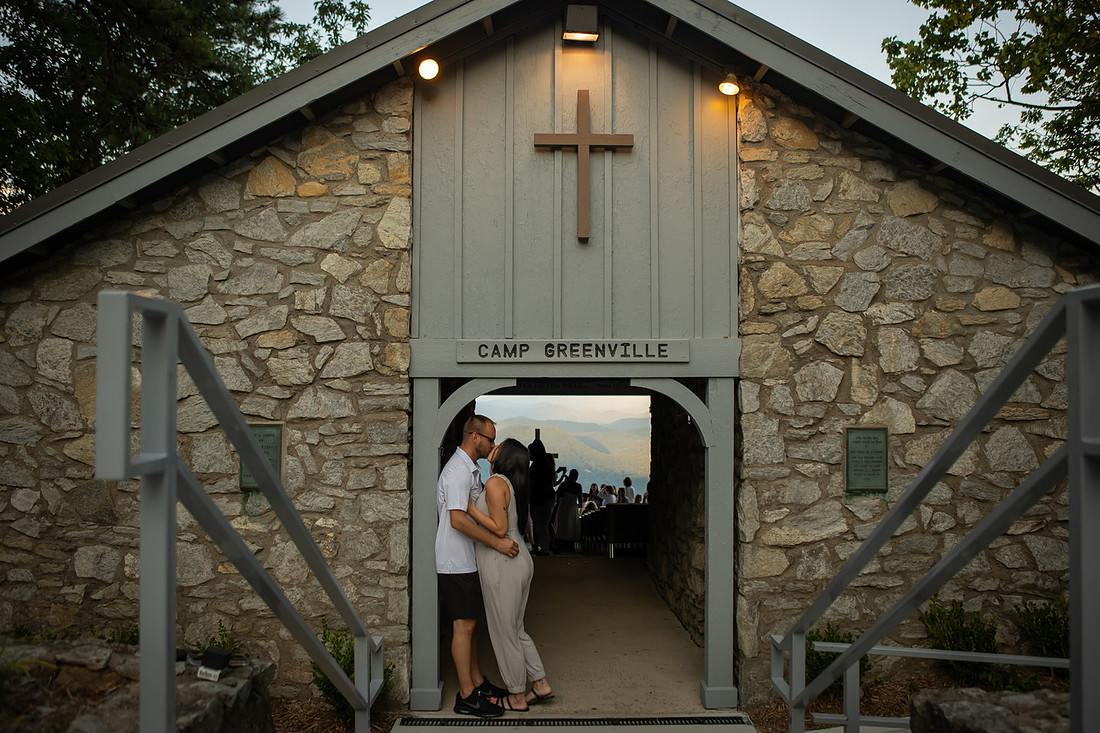 Couple in Front of Pretty Place Chapel Building