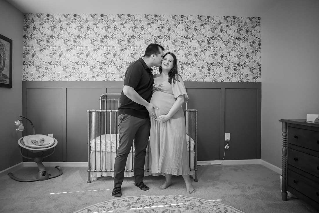 Maternity Photos in the Nursery at Home with Dog and Cat 