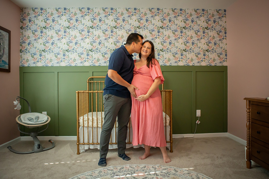 Maternity Photos in the Nursery at Home with Dog and Cat 