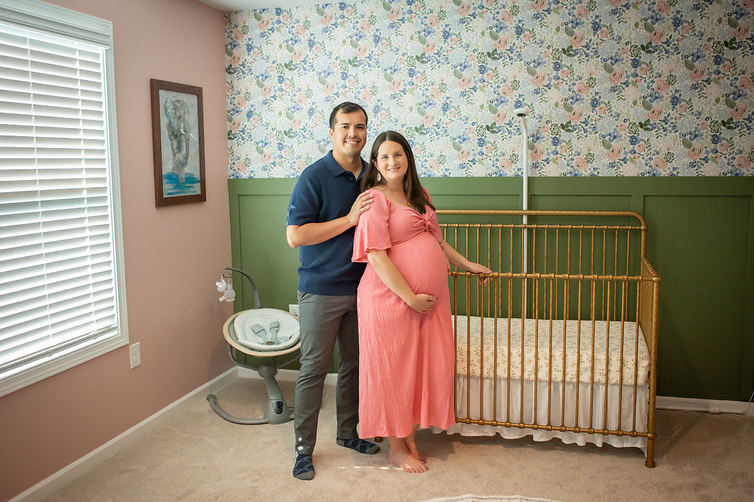 Maternity Photos in the Nursery at Home with Dog and Cat 