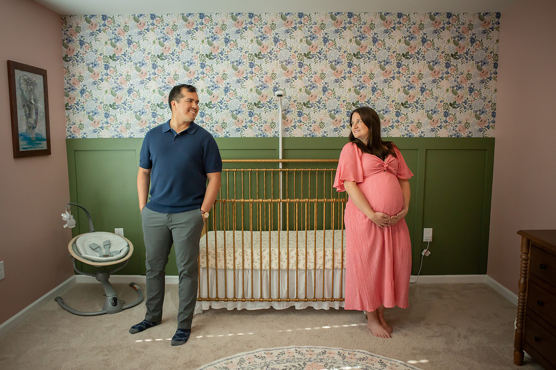 Maternity Photos in the Nursery at Home with Dog and Cat 