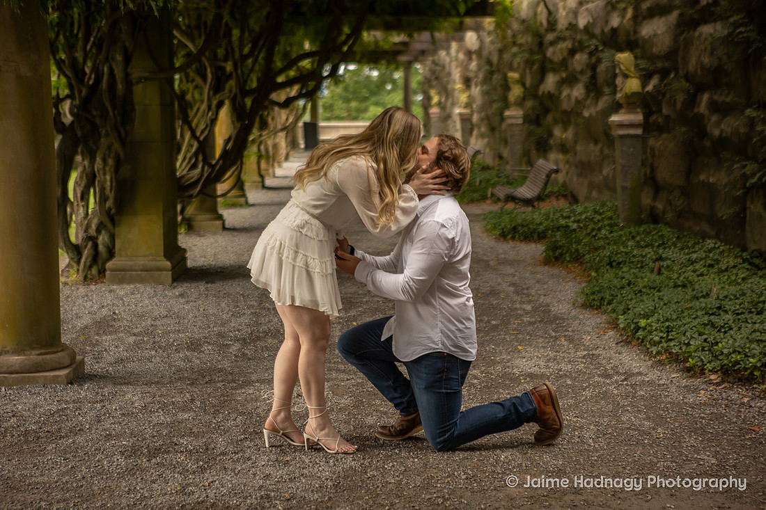 Surprise Proposal Under the Pergola at The Biltmore Estate | Asheville Engagement Photographer
