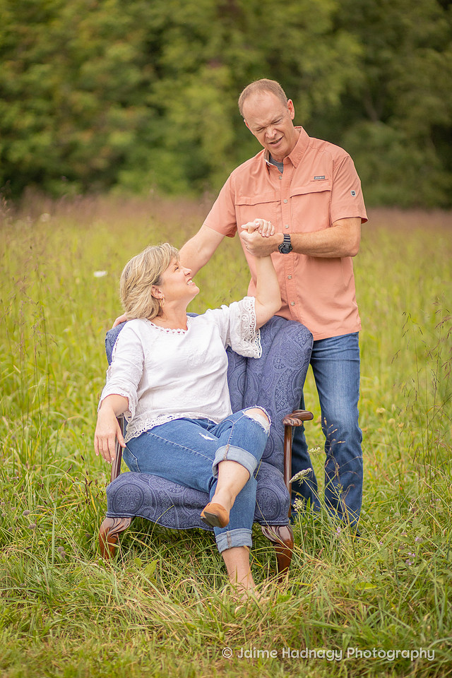 Family Pictures with a chair in a field