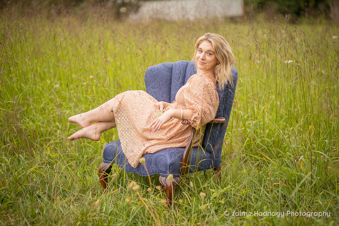 Family Pictures with a chair in a field