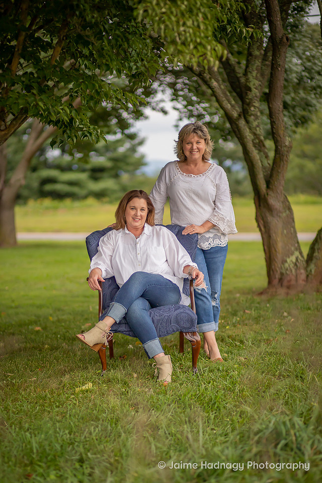 Asheville Family Photographer Portraits with dog in a chair outdoors
